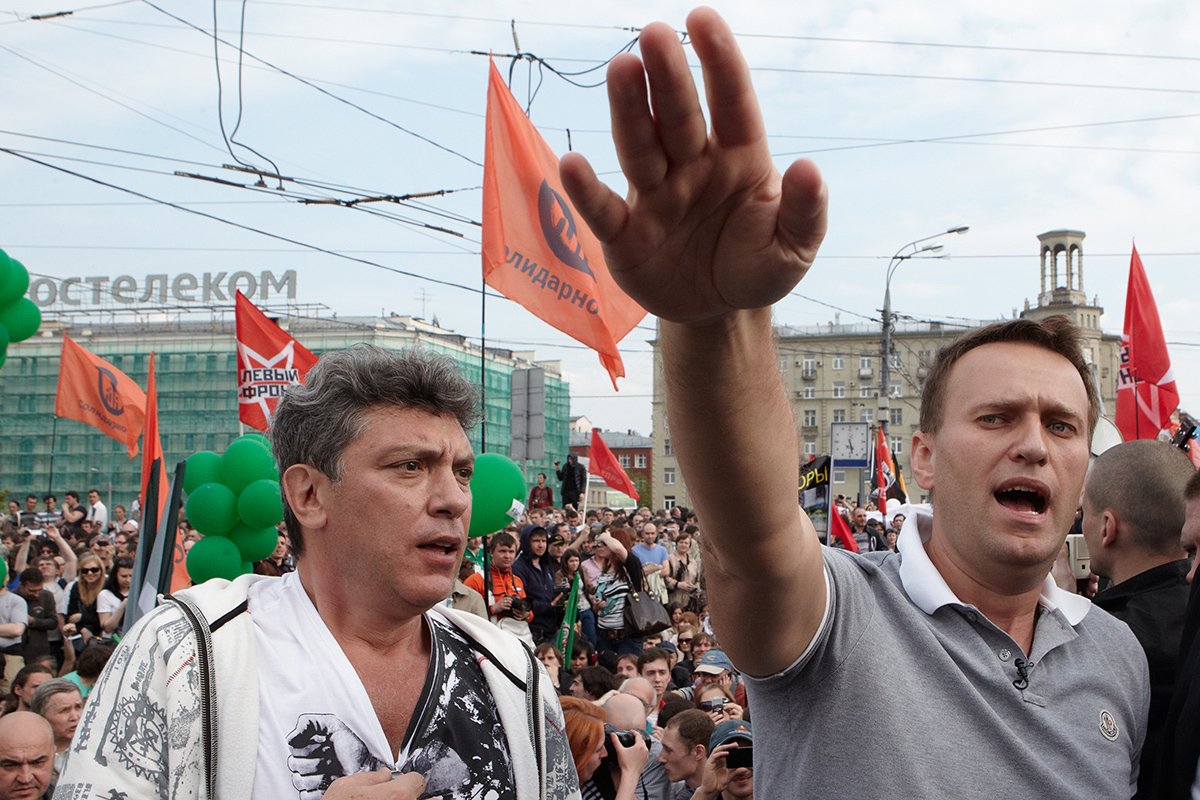 Оппозиционеры Борис Немцов (справа) и Алексей Навальный на митинге «Марш миллионов», Москва, 6 мая 2012 года. Фото: Олег Никишин / Epsilon / Getty Images